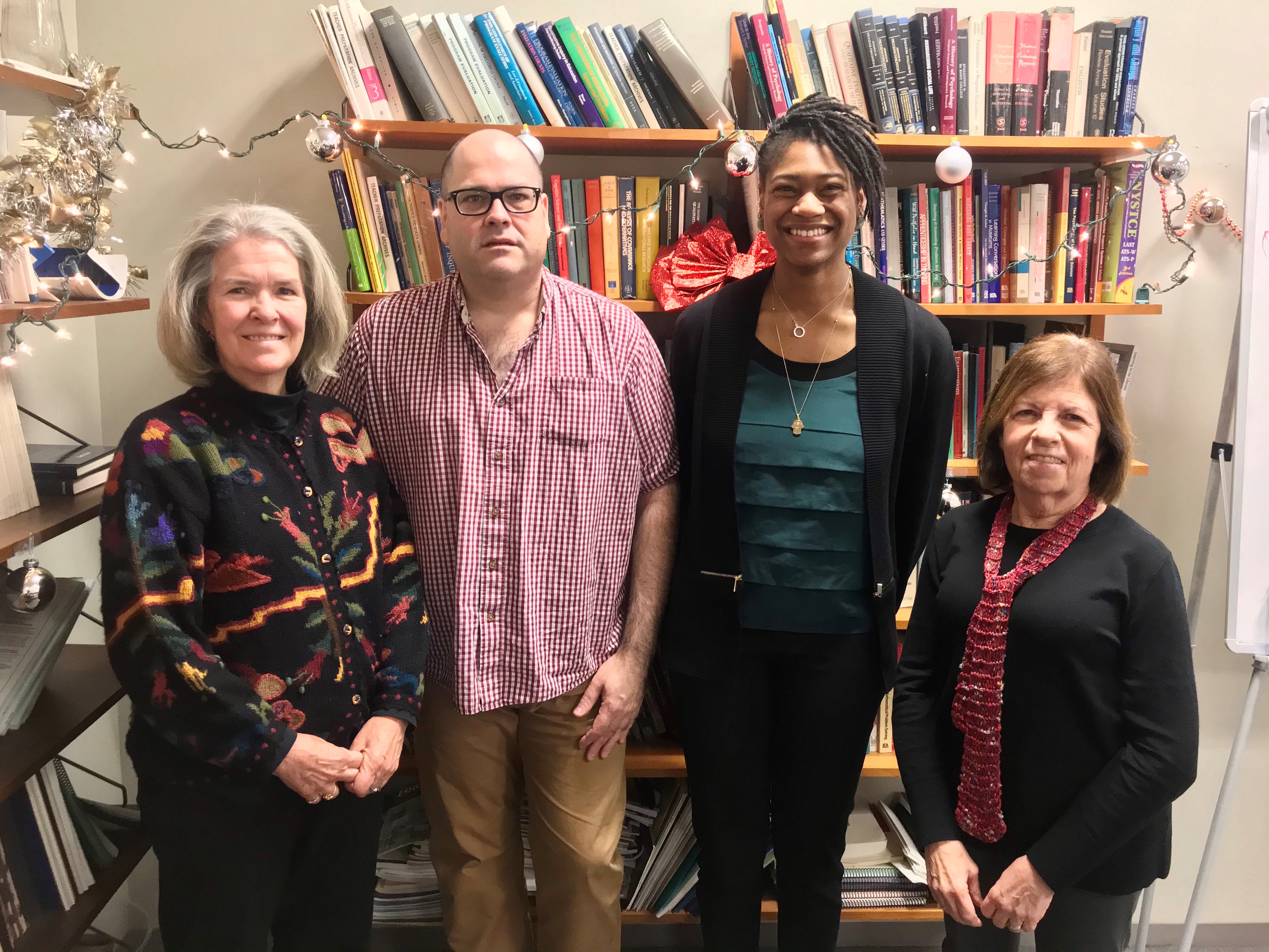 Ashley Davis and her dissertation proposal committee members. From right: Dr. Helen Johnson, Ashley Davis, Dr. Jay Verkuilen, Dr. Mary Foote